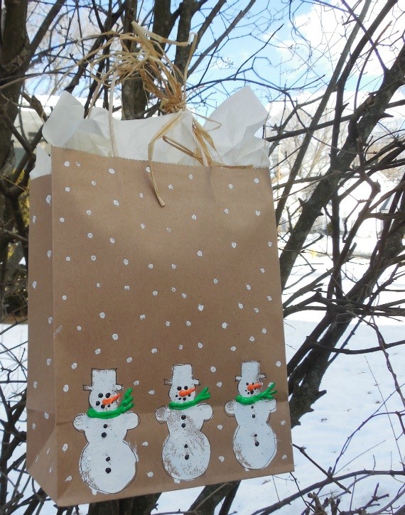 Snowman Bag hanging from tree