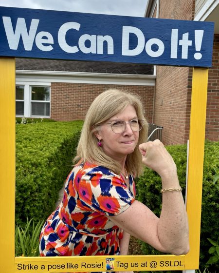 Rosie the Riveter Photo Booth Staff Pose
